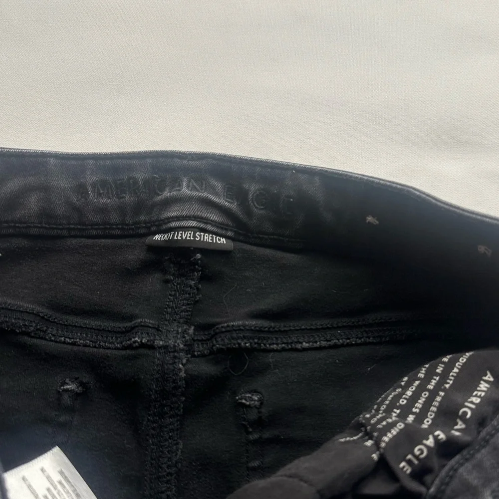 AE Distressed Black Skinny Jeans. Super high waist. Fits size 10-12